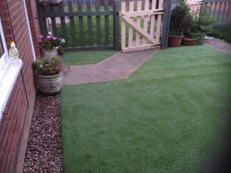 small garden with synthetic grass